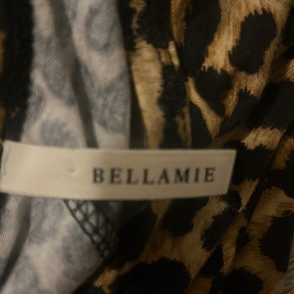 Bellamie sleeveless dress with pockets .